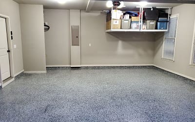 Garage Floor Resurfacing: Fix A Pitted Garage Floor