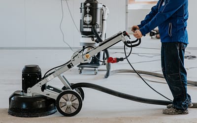 How do you coat a concrete garage floor with epoxy?